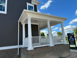 White gutters installed on a porch