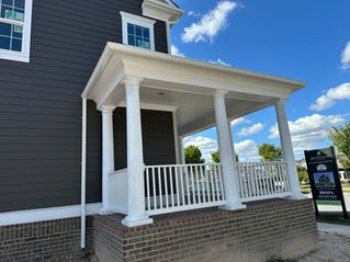 White gutters installed on a porch