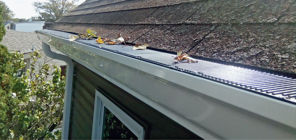 Raindrop Gutter Guard Installed white gutters