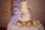 Cupcakes offer another flavour choice for guests alongside a multi flavour three tier wedding cake 