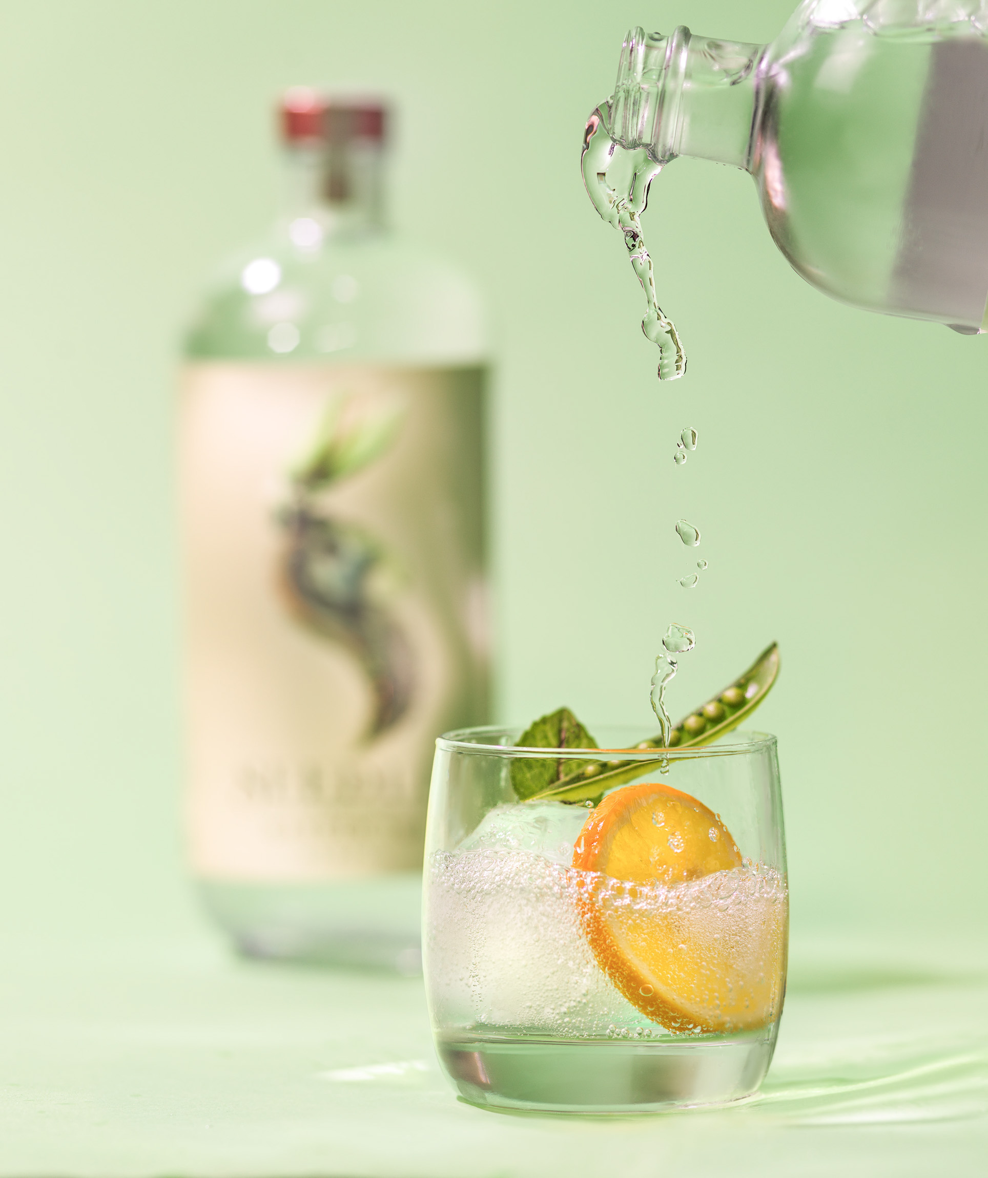 Herbal citrus non alcoholic cocktail splash pour light. 
