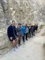 Canyon hike: The Network San Diego members on a group hike through a sandstone canyon
