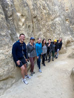 Canyon hike: The Network San Diego members on a group hike through a sandstone canyon