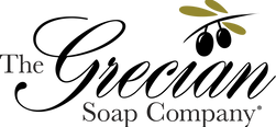 Logo for the Grecian Soap Company featuring Script font and illustration of an olive branch.
