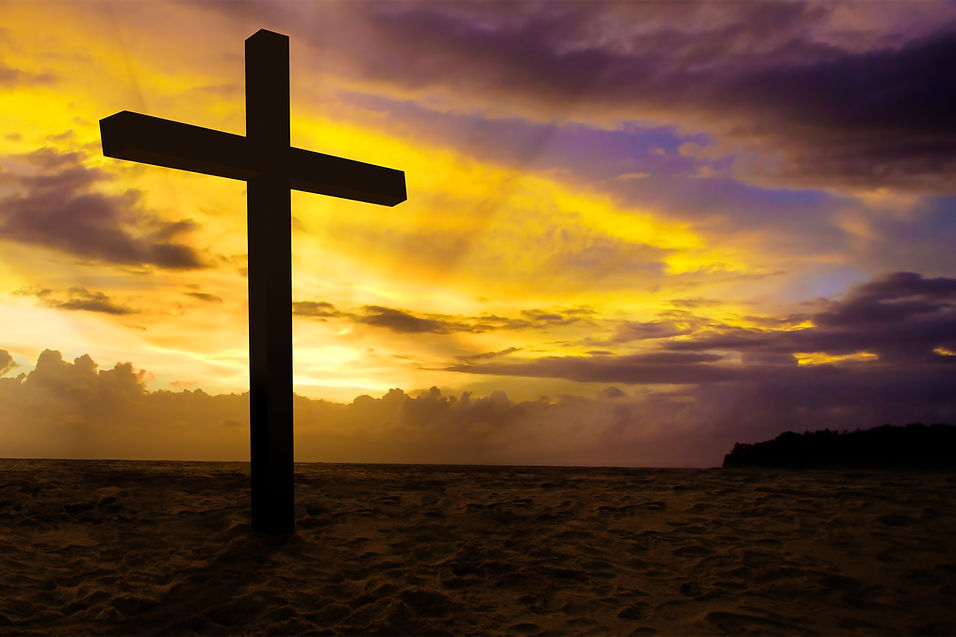 christian cross on sunset background.jpg