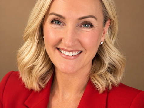 A headshot of Jo Reid