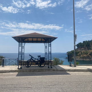 A bicycle in a pagoda overlooking the sea