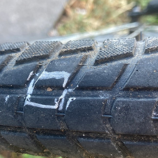 A thorn in a tyre - a square of chalk around it