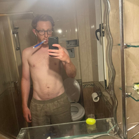 A skinny me brushing my teeth