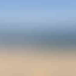 Blue sky, bluer sea, white(ish) sand