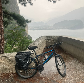 A bike in the rain above a lake