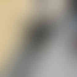 Battered bike leaning on a wall