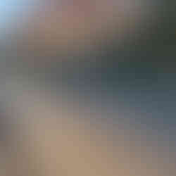 An Albanian communist mural with dusk lighting