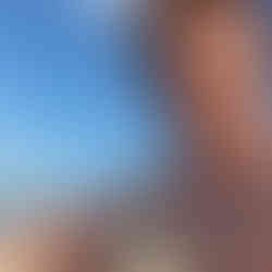 Bearded me smiling in the beach sun