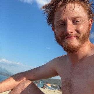 Bearded me smiling in the beach sun