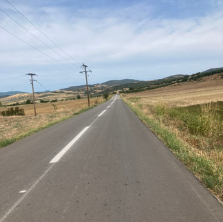 A flat straight road leading off into the distance