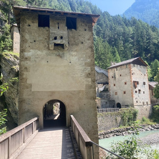 A castle across a mountain river