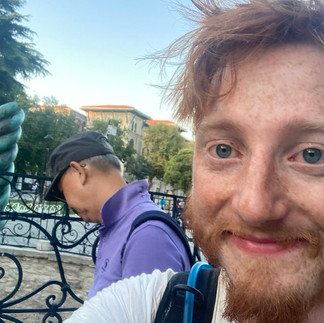 Me smiling in front of the other half of the snake pillar