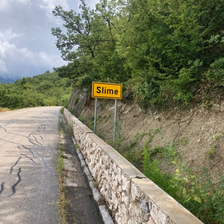 A road sign that says Slime