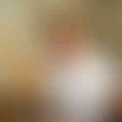 me looking happy holding a beer