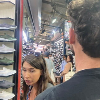 Becca and co in a shoe market