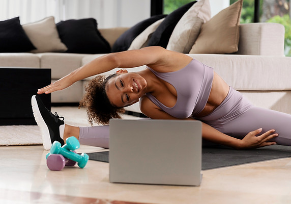 medium-shot-woman-stretching-home_edited.jpg