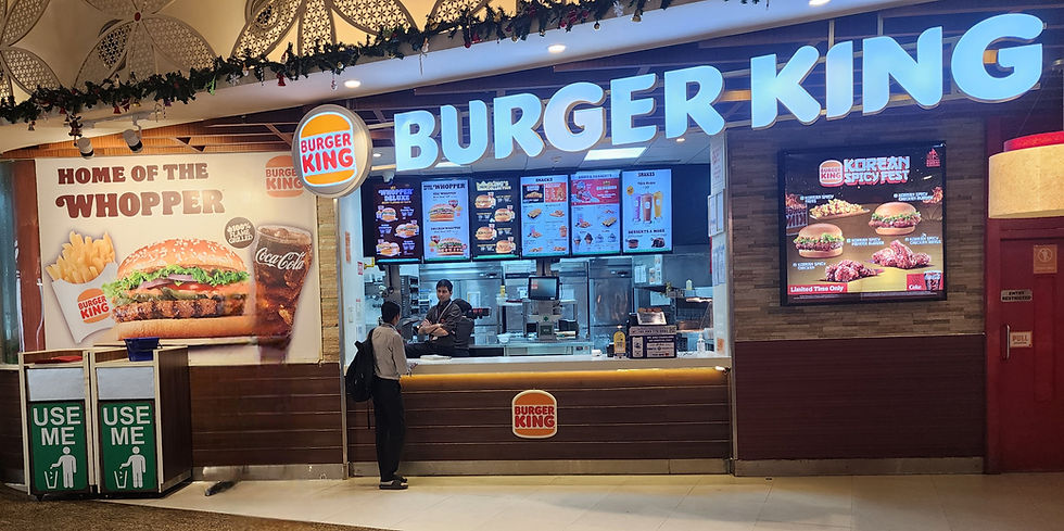 If you zoom in, you can see Burger King's offerings in India. Their Whoppers are made with chicken, because cows are sacred.