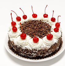 Black forest cake decorated with whipped