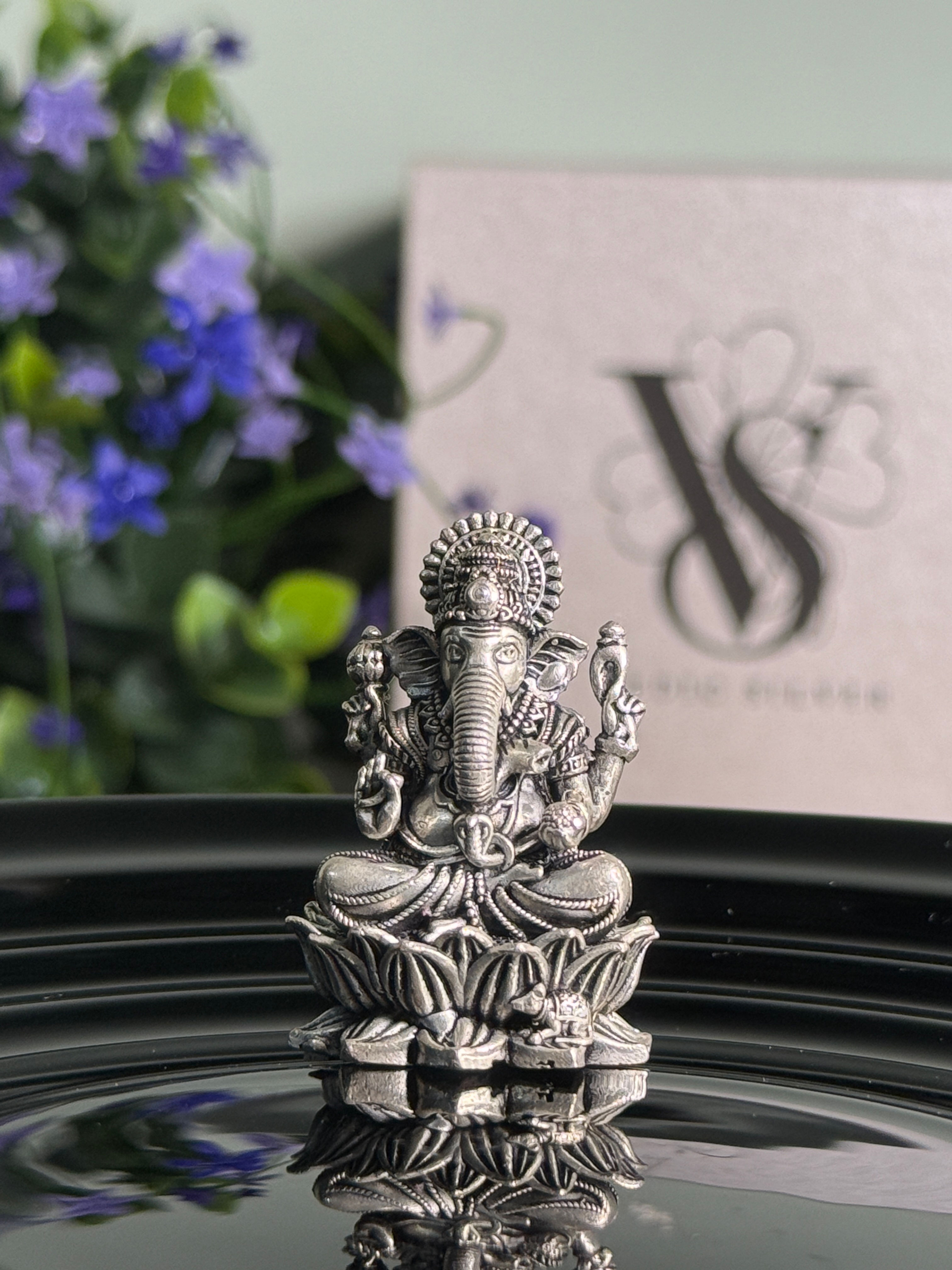 Padmam Ganesh Silver Idol