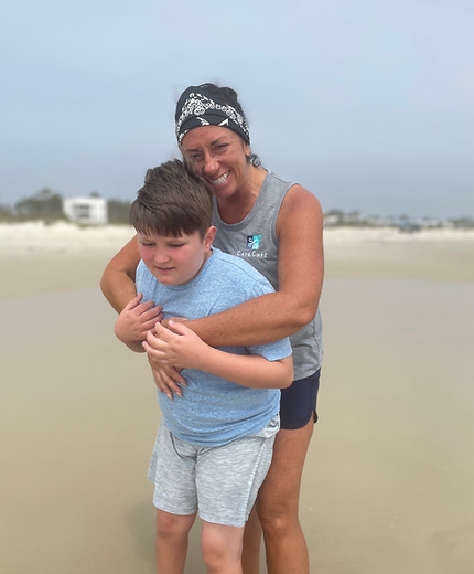 The founder of Care Cuts, Missi with her son Jess