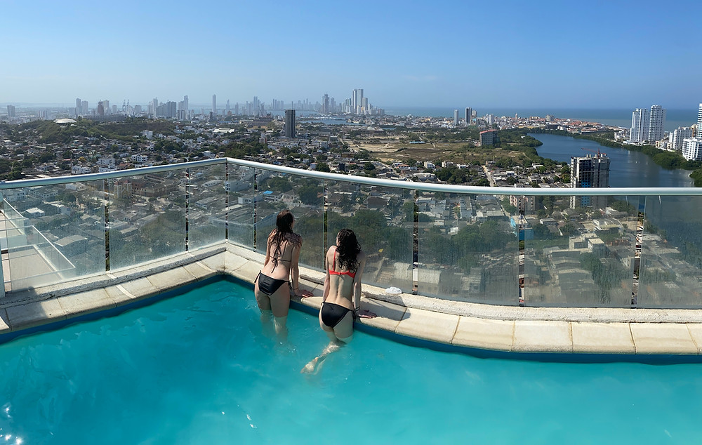 Two girls in a rooftop pool