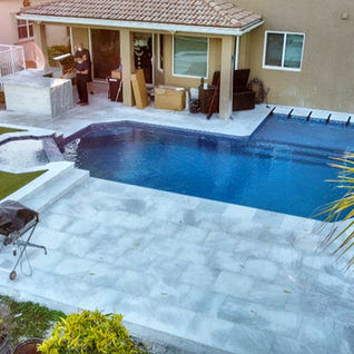 Backyard pool with a patio and barbecue grill, Kitchens and Pools