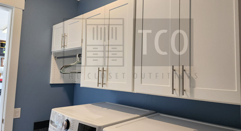 Laundry room with upper cabinets & a rod