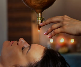 Shirodhara warm oil Ayurvedic treatment for peace, anxiety and stress