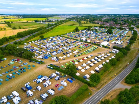 Aerial view of Hamilton Fields Campsite Silverstone showing tents, caravans, motorhomes, glamping, pre-pitched tents, bar, location