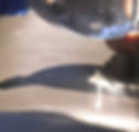 Water bottle hovering over a car seat with refracted sunlight hitting a spot and causing it to smolder.