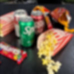 Close-up view of a baseball glove and ball on a wooden bench