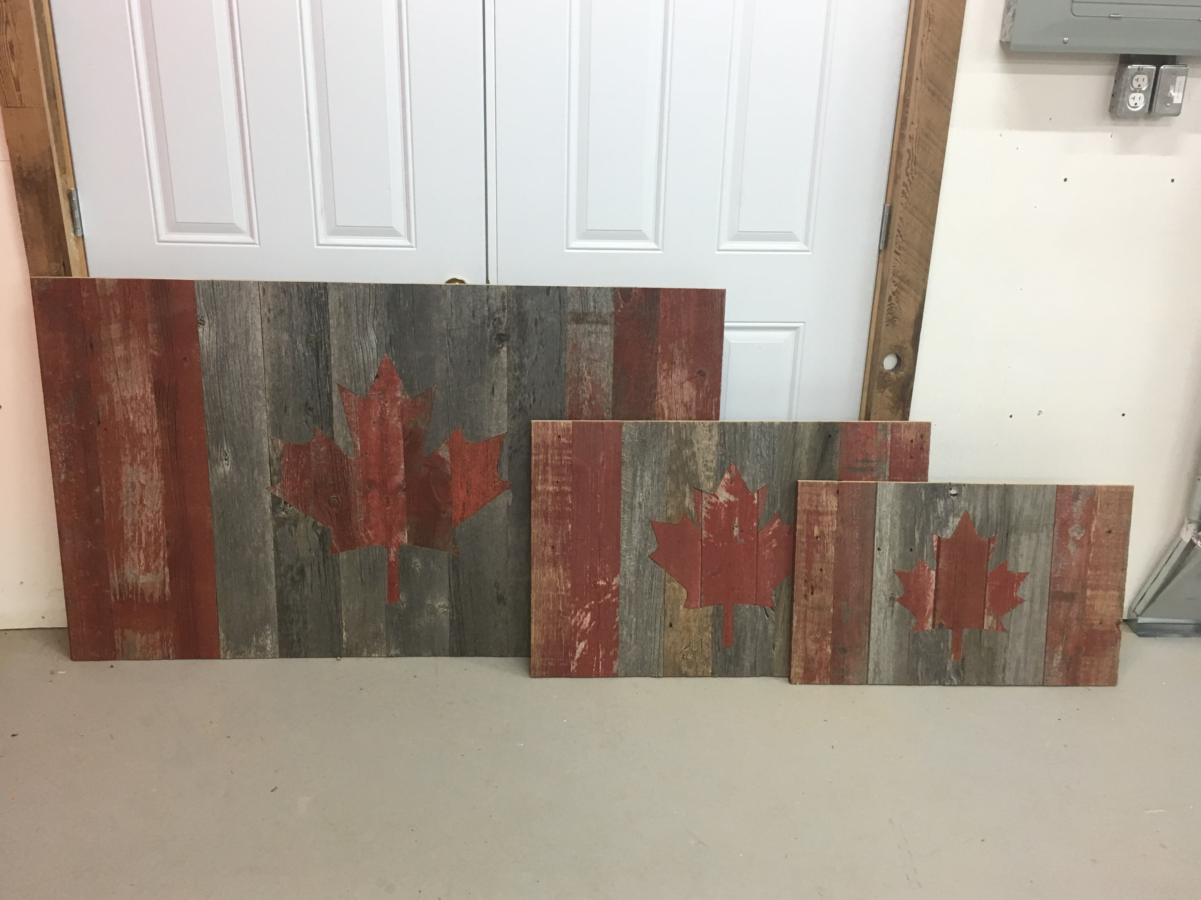 Reclaimed grey and red board Canada flags
