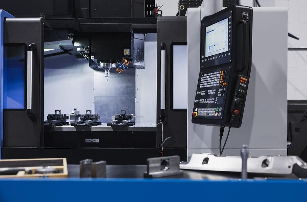 Industrial CNC machine with control panel in operation