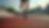 Eye-level view of running shoes on a track