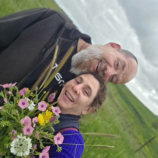 Micha and Ayelet out in the fields with the wild flowers duting times of war