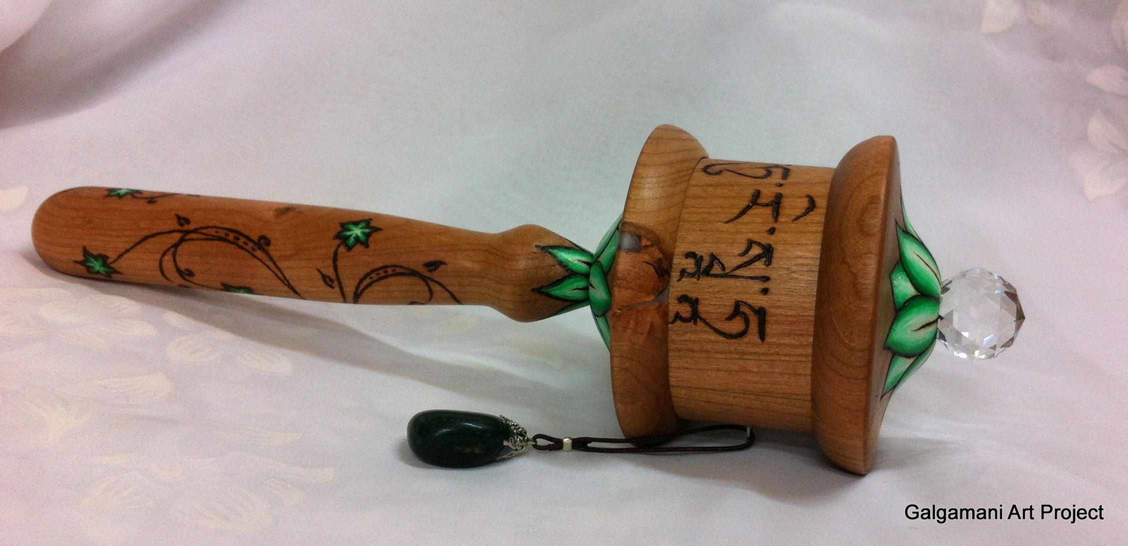 medium size 10 million Green Tara Tibetan handheld prayer wheel made from Cherry hardwood