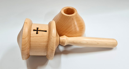 Christian prayerwheel with a beautiful stand on a white desk