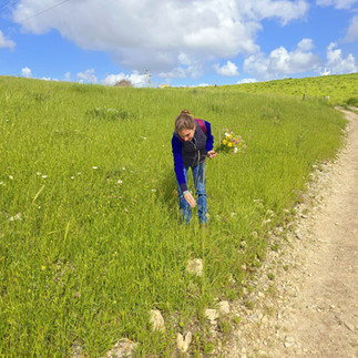 Ayelet out in the fields during war times