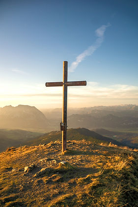 Cross in mountains