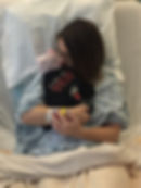 Finley and Jessie snuggles at hospital