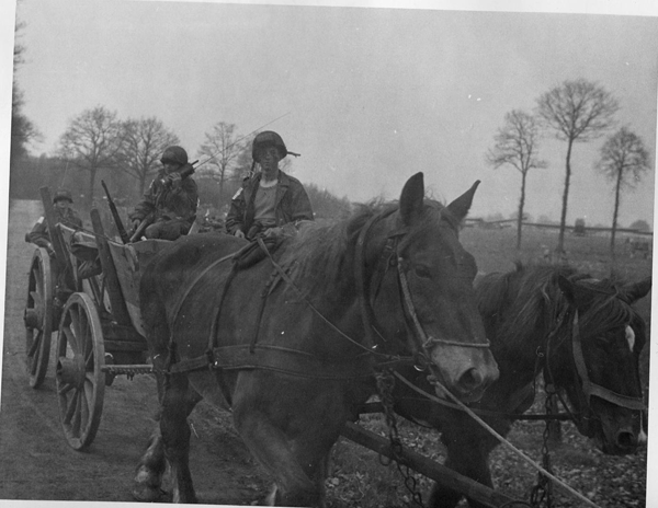 202652 507th Varsity, men with wagon
