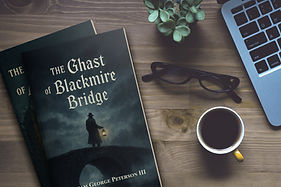 Ghast of Blackmire Bridge on table with computer.jpg