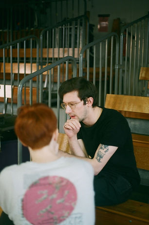 Emma and Andrew in discussion about the