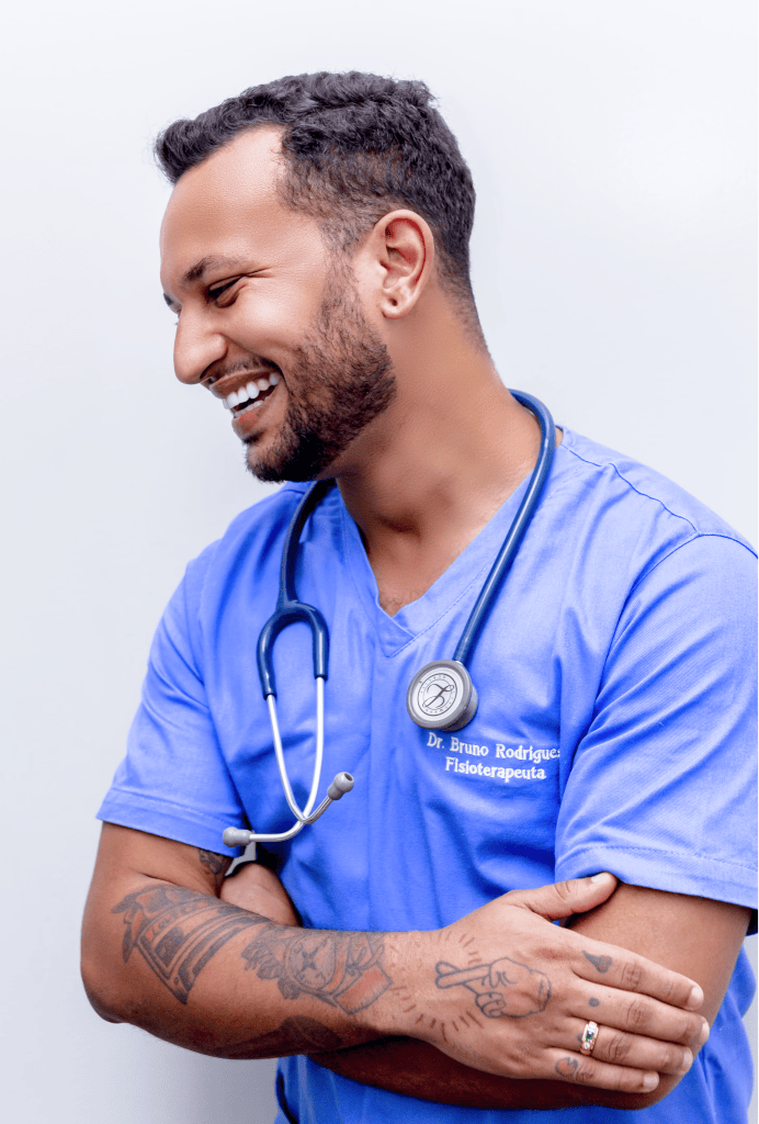 A doctor laughing and wearing a stethoscope